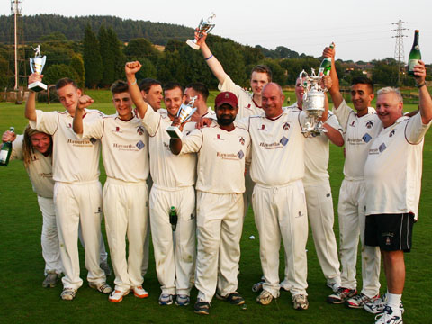 Team and trophy on field